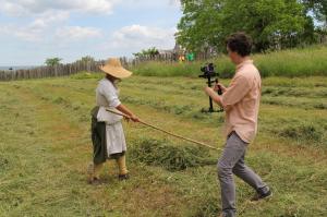 From Pelham Island Pictures' Facebook page.  Filing for our upcoming documentary about Wayland’s history. In the shot above, Jacob films a 17th century farmer preparing hay for the town’s cattle.