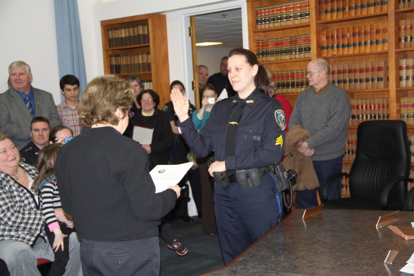 Jennifer Ordway is sworn in as the next sergeant on the Wayland Police Department by Town Clerk Beth Klein at the Board of Selectmen’s meeting Thursday night.
