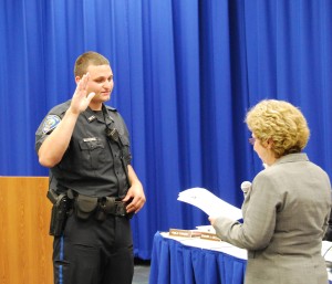 Officer Henderson was sworn in by Town Clerk Beth Klein at the Board of Selectmen meeting on August 11.  Source: Wayland Police Department