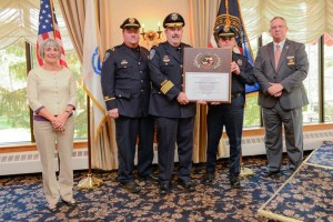 From left To right, Board of Selectmen member Lea Anderson, Lt. Pat Swanick, Chief Robert Irving, Accreditation Manager Sgt. Sean Gibbons, and President of the Massachusetts Police Accreditation Commission, Chief Mark Leahy of Northborough after receiving police certification at the Andover Country Club on November 5th