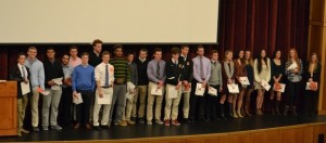 Wayland High School’s Dual-County League Award Recipients take the stage to receive their certificates at the Wayland Boosters Fall Sports Awards Ceremony on Wednesday, December 2 at WHS. 